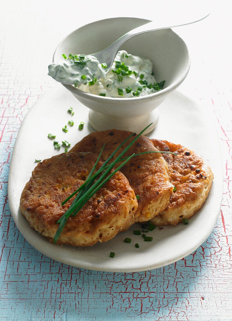 Spicy lentil and peanut butter cakes with chive quark