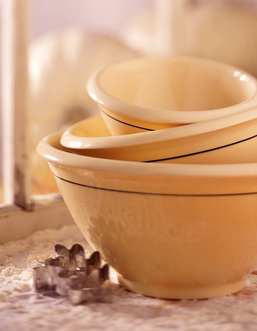 Stacked Mixing Bowls; Flour and Cookie Cutters
