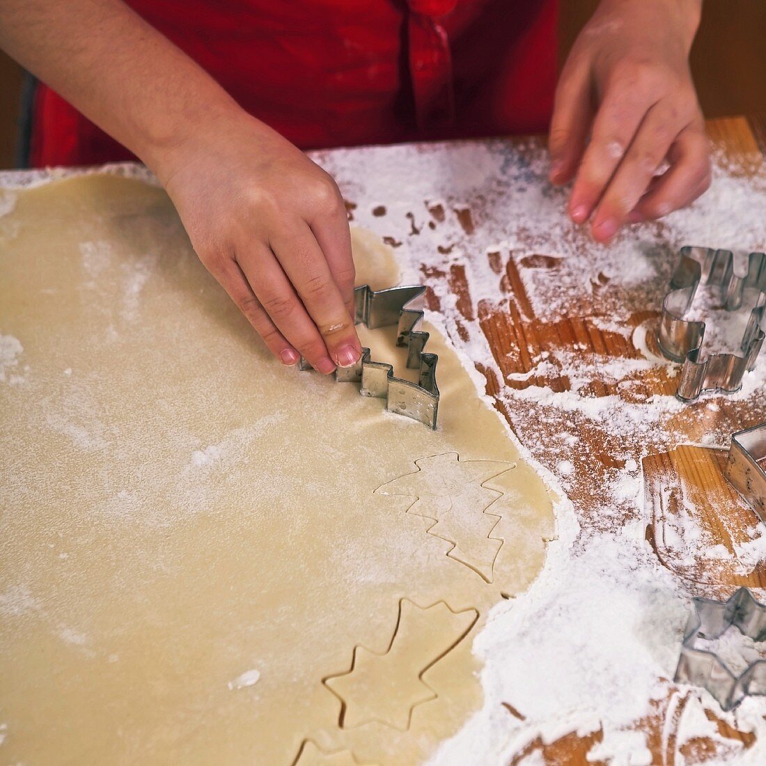 Christmas biscuits being cut out