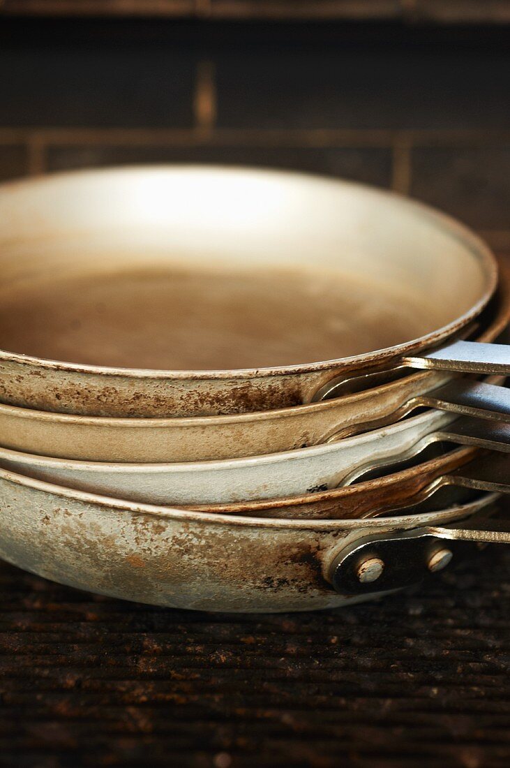 Stack of Pans on Cooking Surface