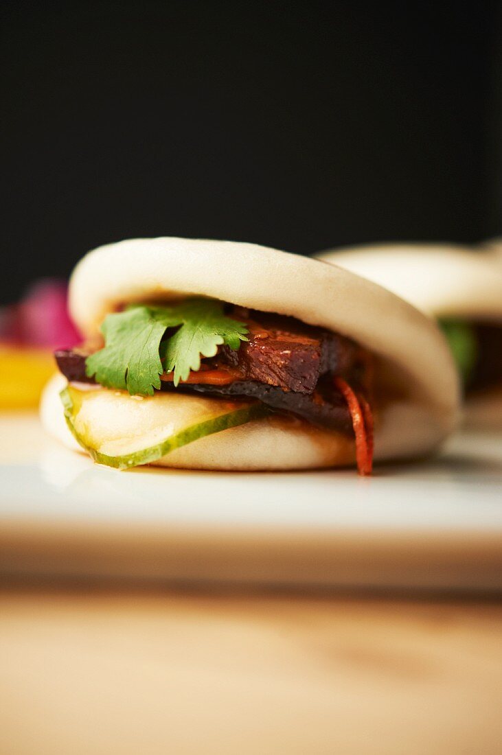 Steamed Chinese Bun with Pork Belly, Cilantro and Chili Pepper