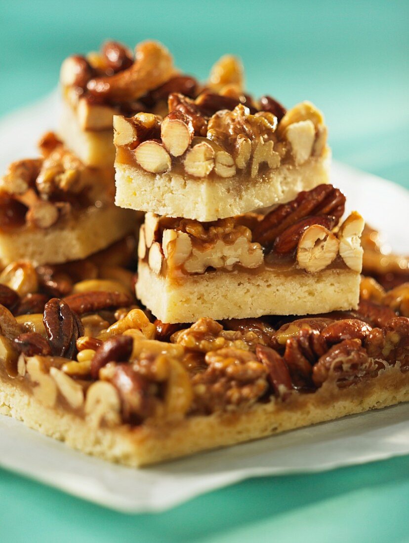 A stack of nut bars with caramel