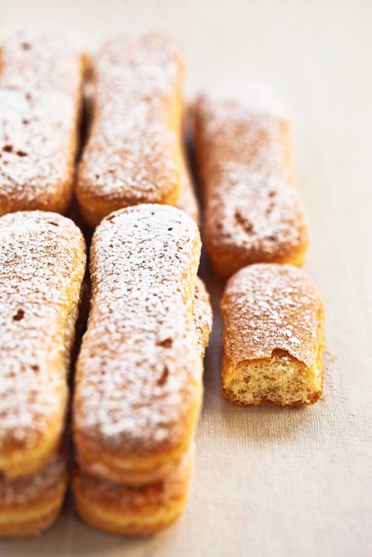 Sponge fingers dusted with icing sugar
