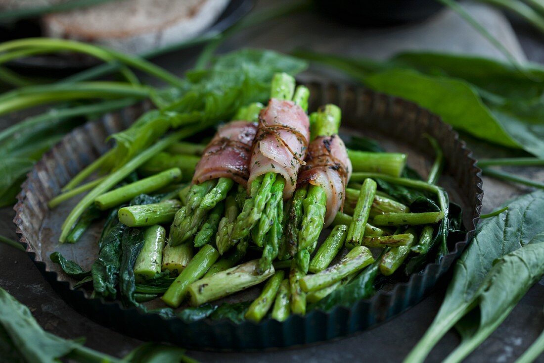 Thai asparagus wrapped in ham with spinach