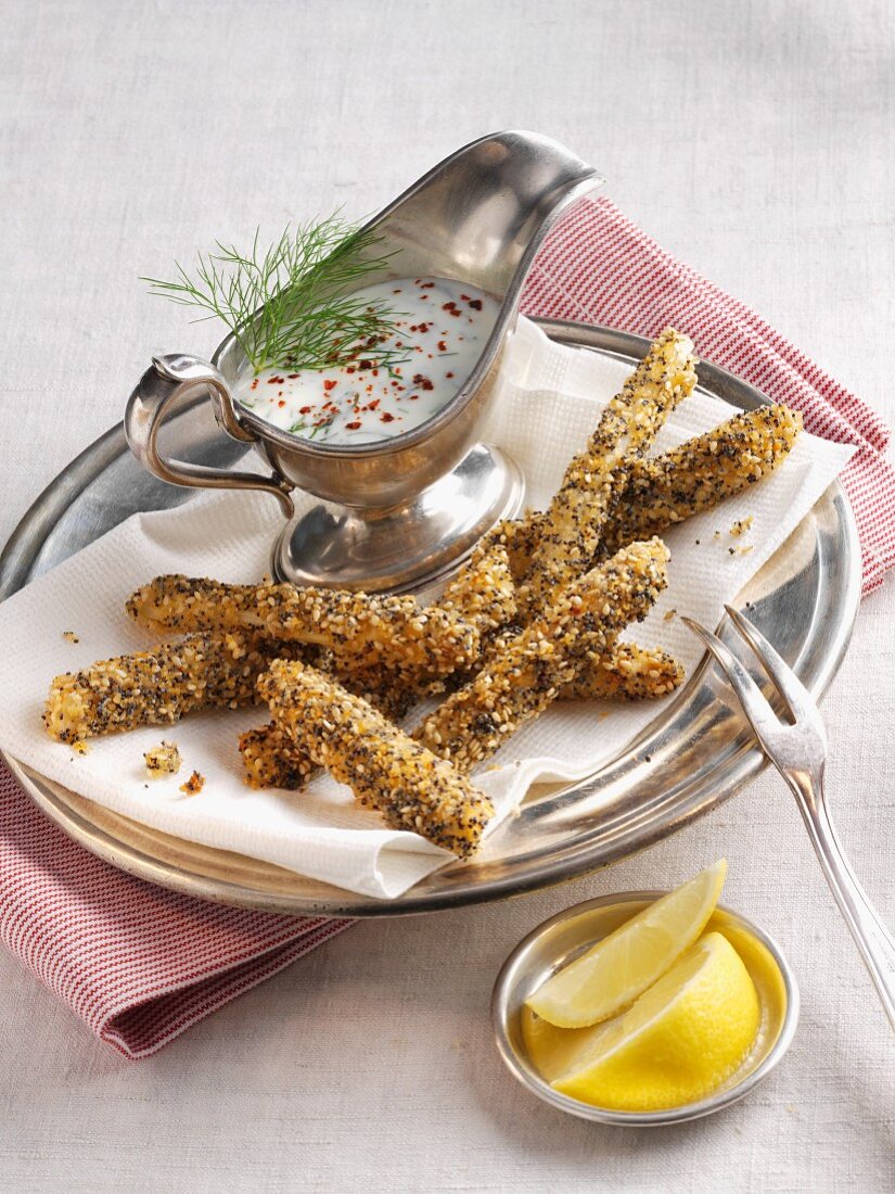 White asparagus in a spicy sesame coating and a yogurt dip