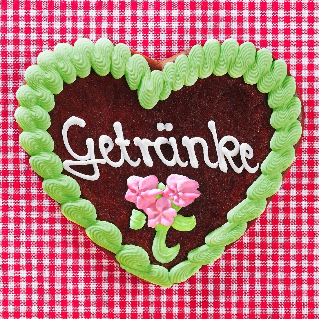 A gingerbread heart decorated with the word 'Getränke' ('Drinks')