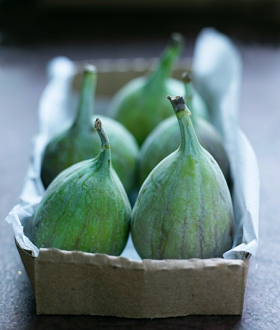 Fresh figs in a paper box