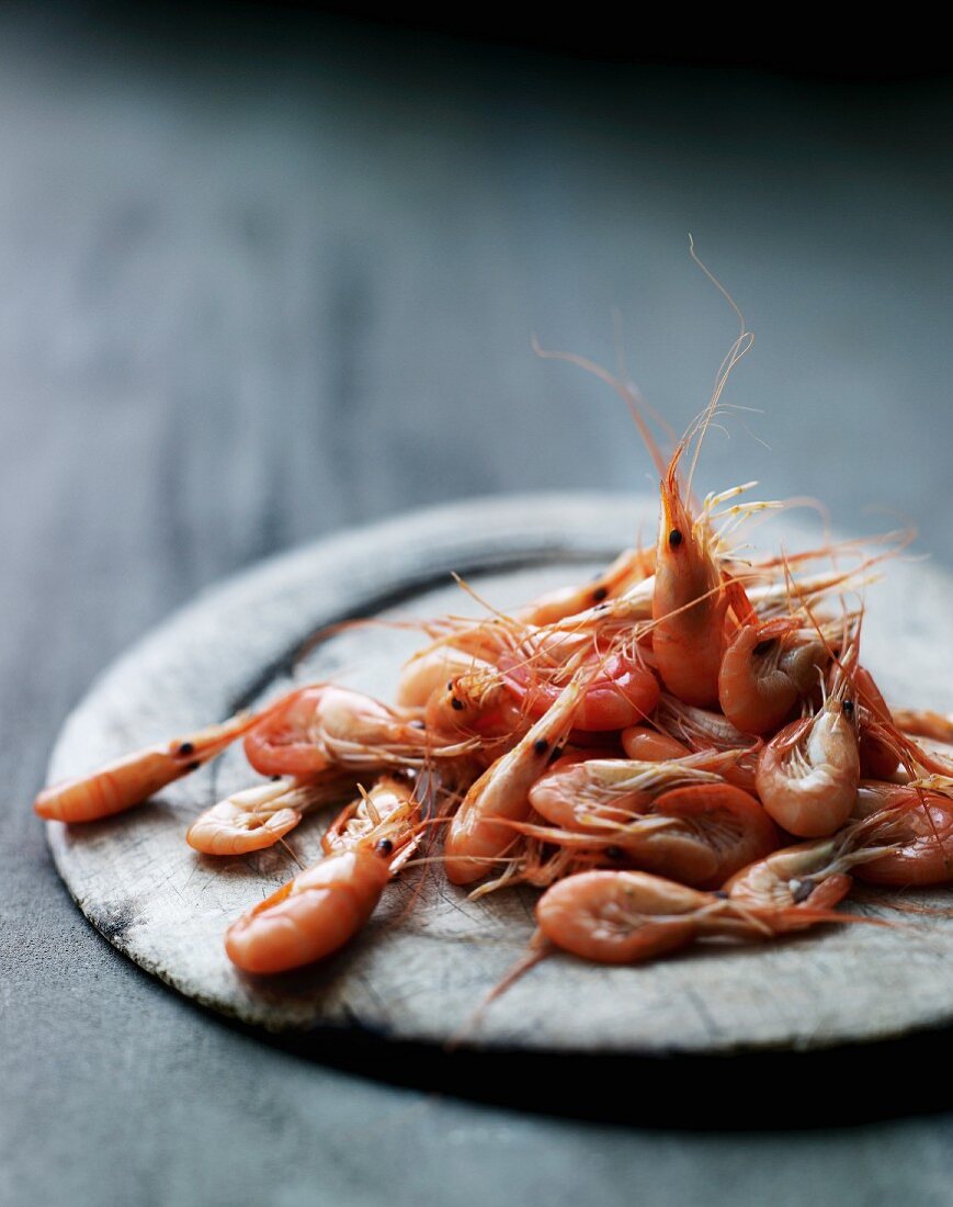 Prawns on a wooden plate