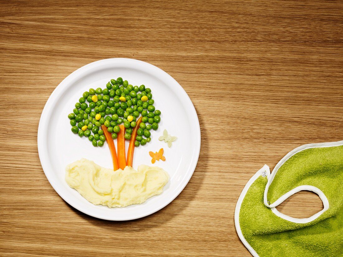 A tree of peas with mashed potatoes (children's meal)