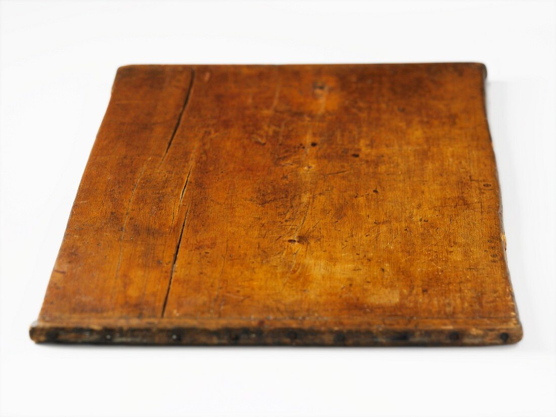 An old wooden chopping board