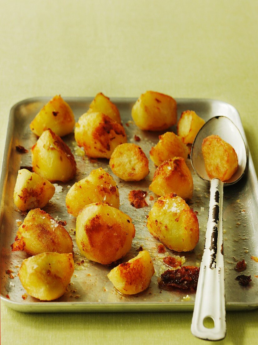 Oven roasted potatoes on a baking tray