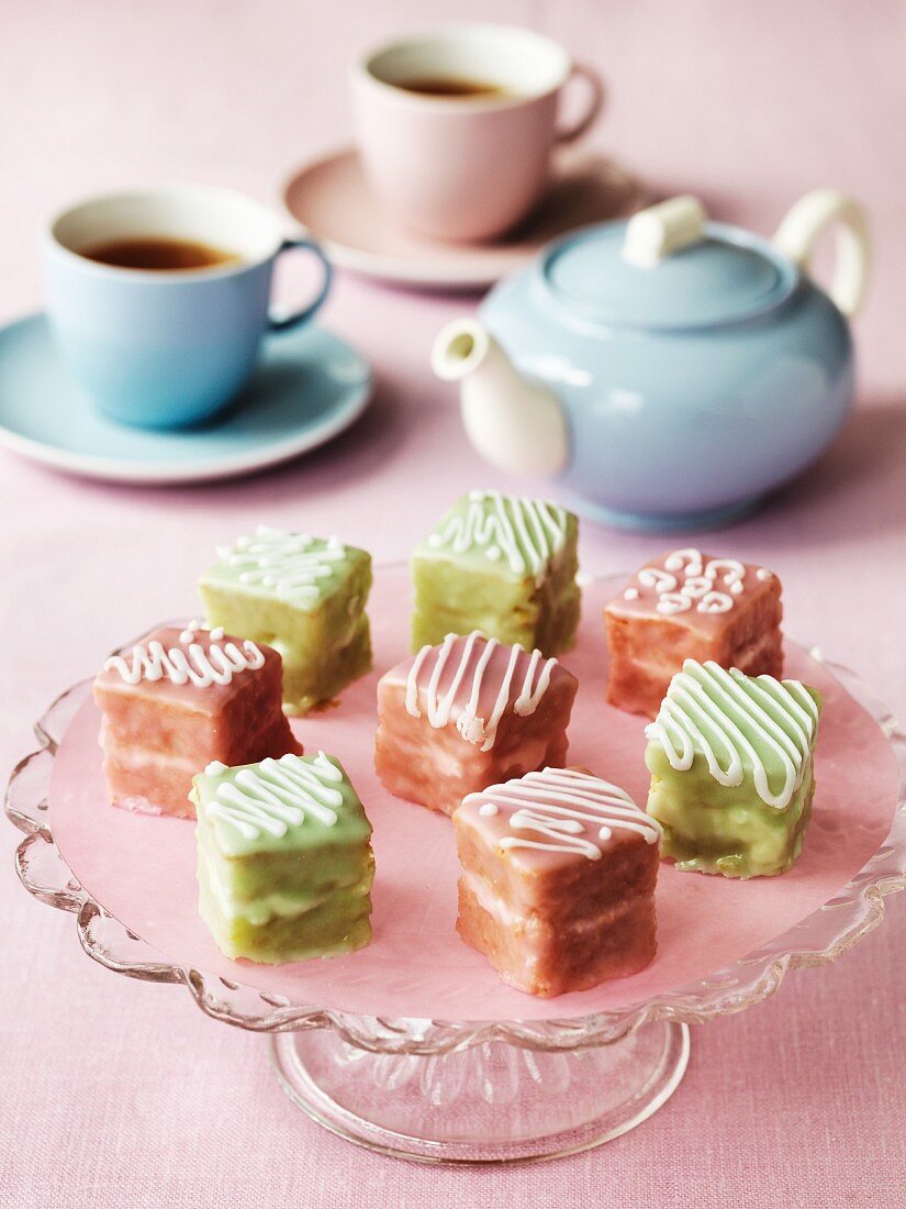 Various petit fours on a cake stand for tea