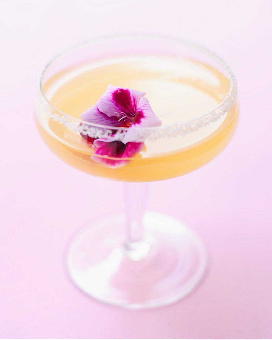 A lemon drink decorated with a flower