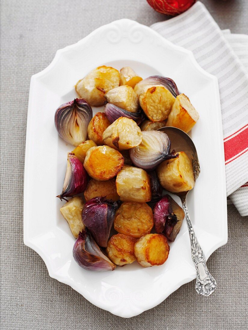 Potatoes and red onions with maple syrup