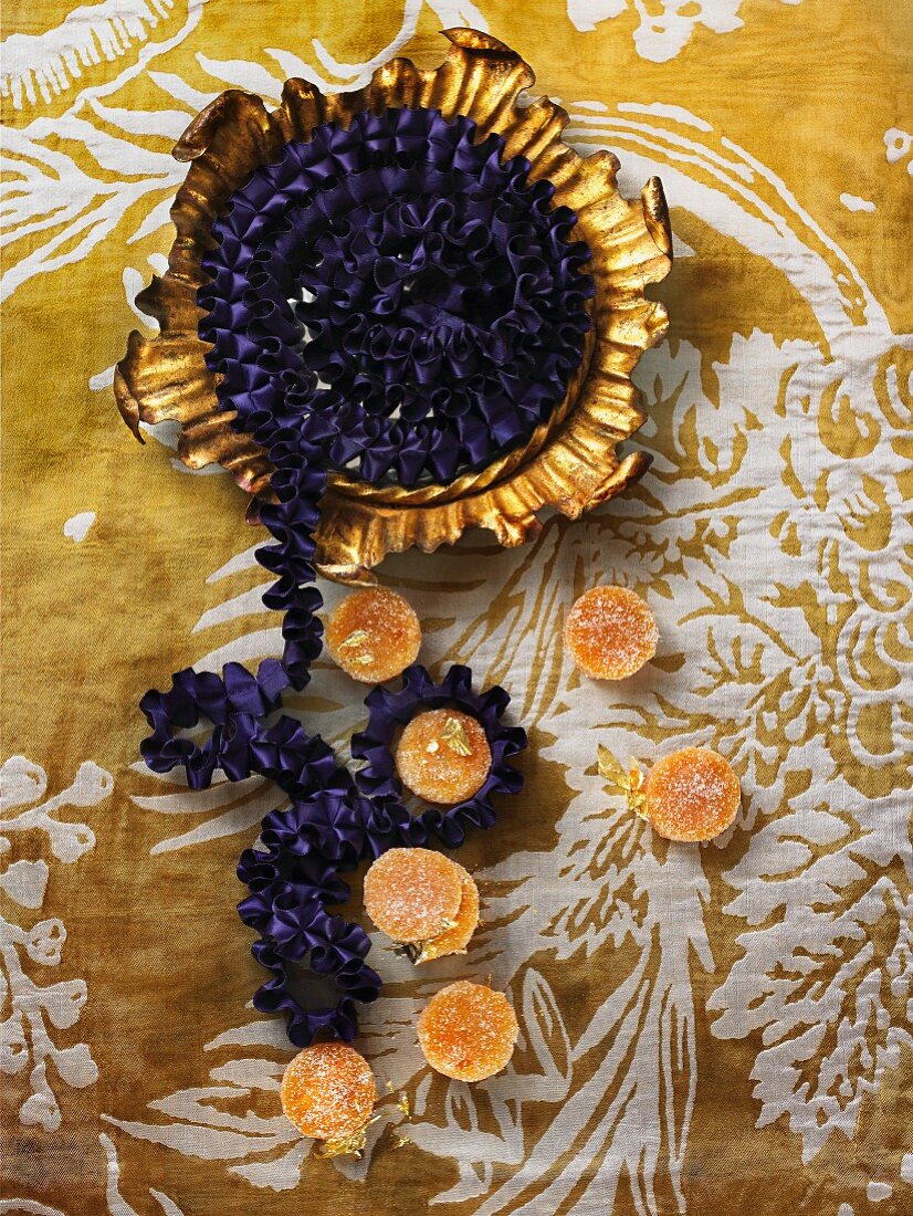 Apricot cakes decorated with gold leaf