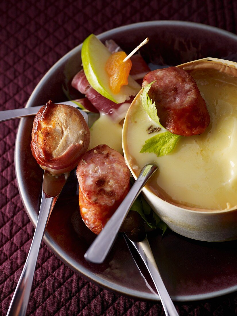 Cheese fondue with sausage