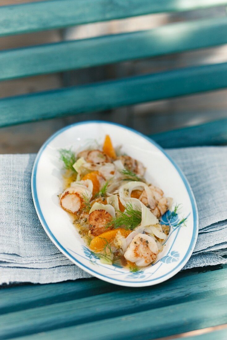 Fried scallops on a fennel and orange salad