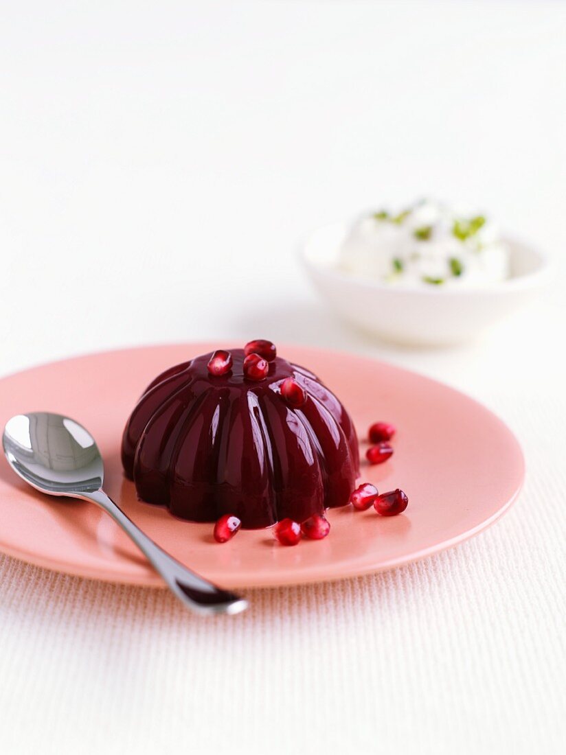 Red jelly with pomegrante seeds