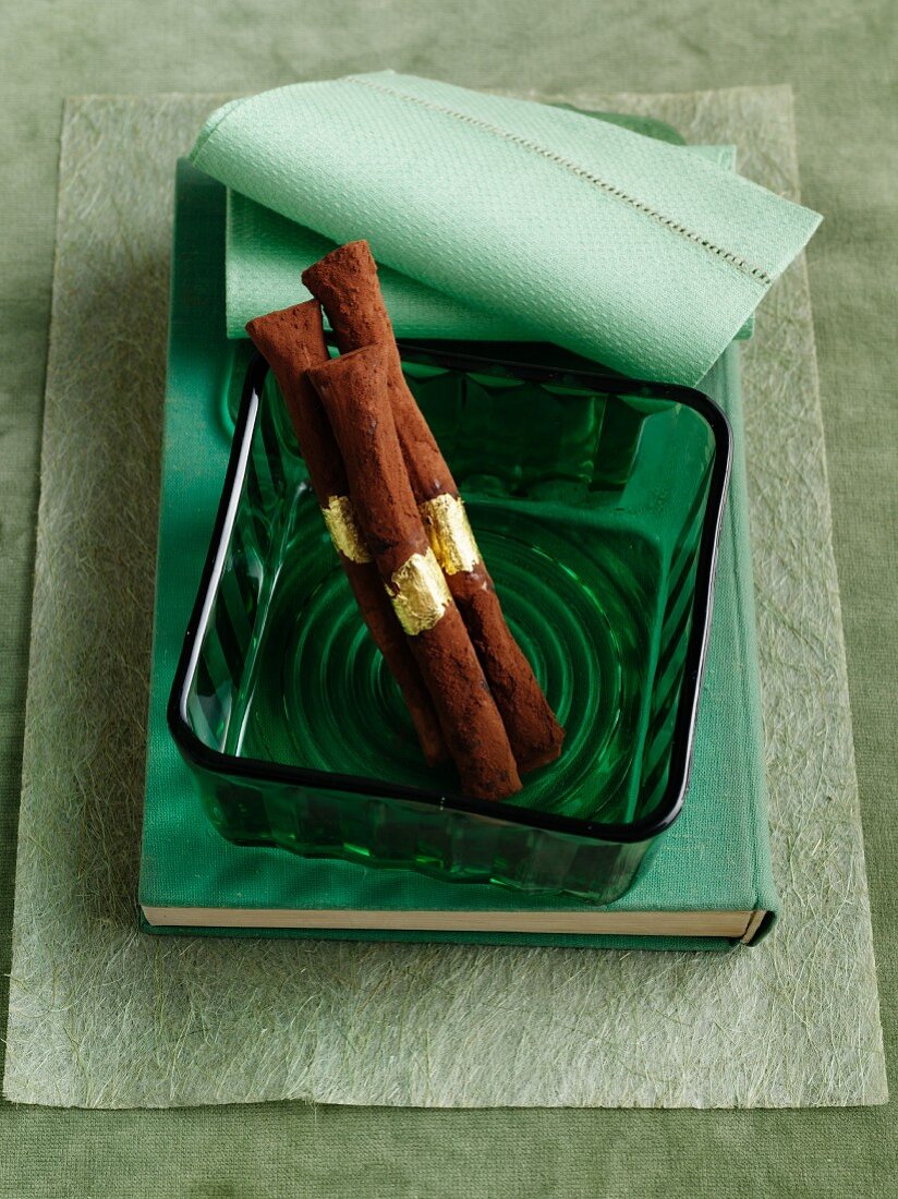 Peppermint cigars with gold leaf