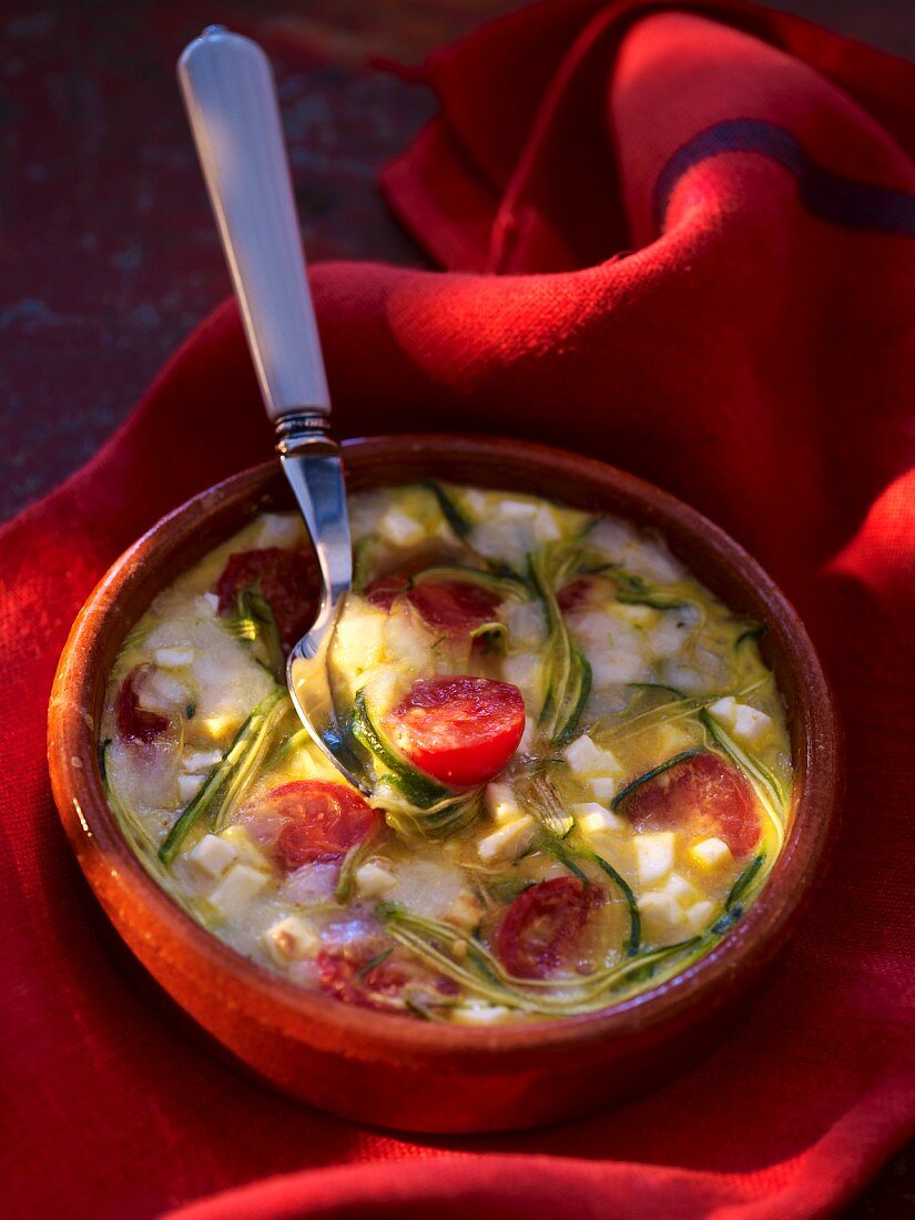 Clafouti with cherry tomatoes and cheese