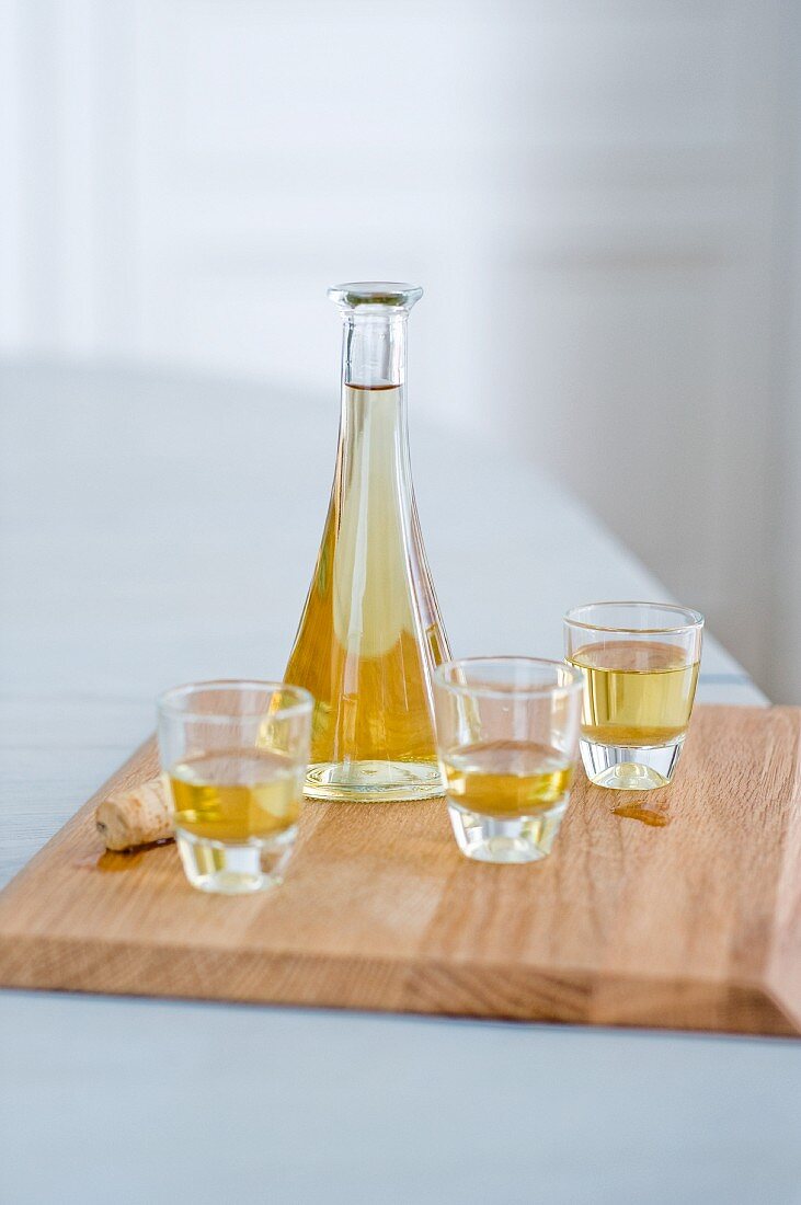 Ratafia liqueur in a carafe and glasses