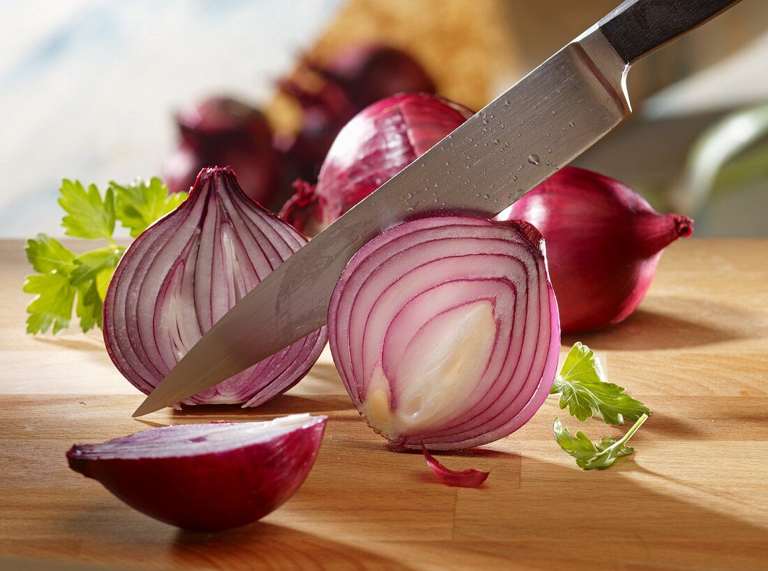 Red onions being sliced