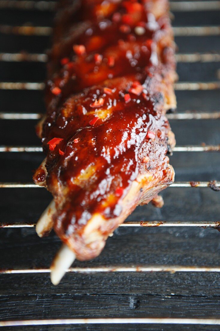 Spare ribs on a barbecue (close-up)