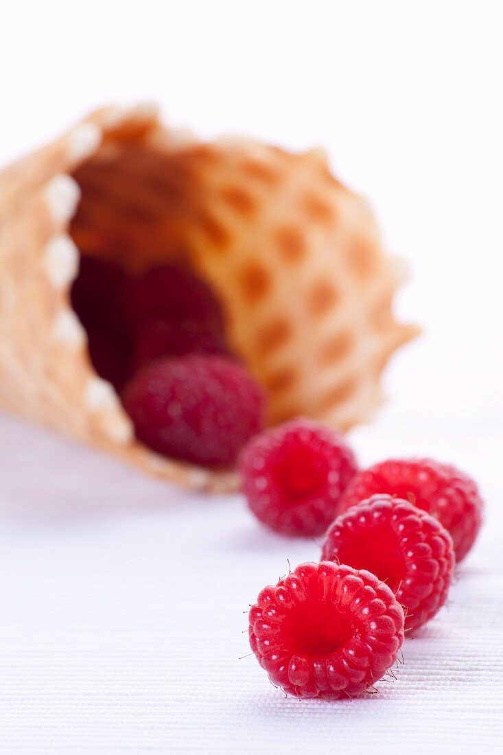 Raspberries and an ice cream cone