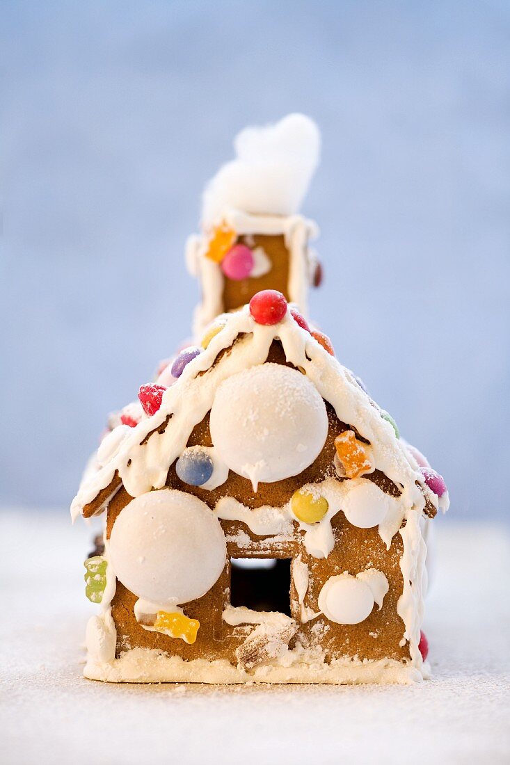 A gingerbread house decorated with sweets