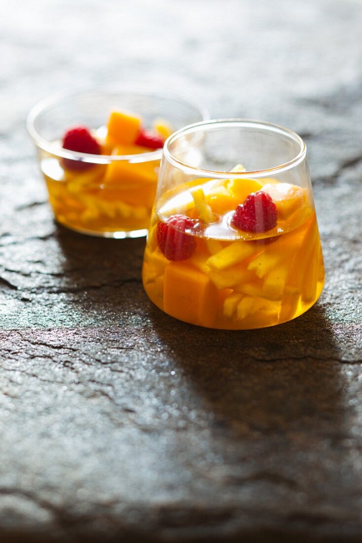 Fruit salad with pineapple and raspberries