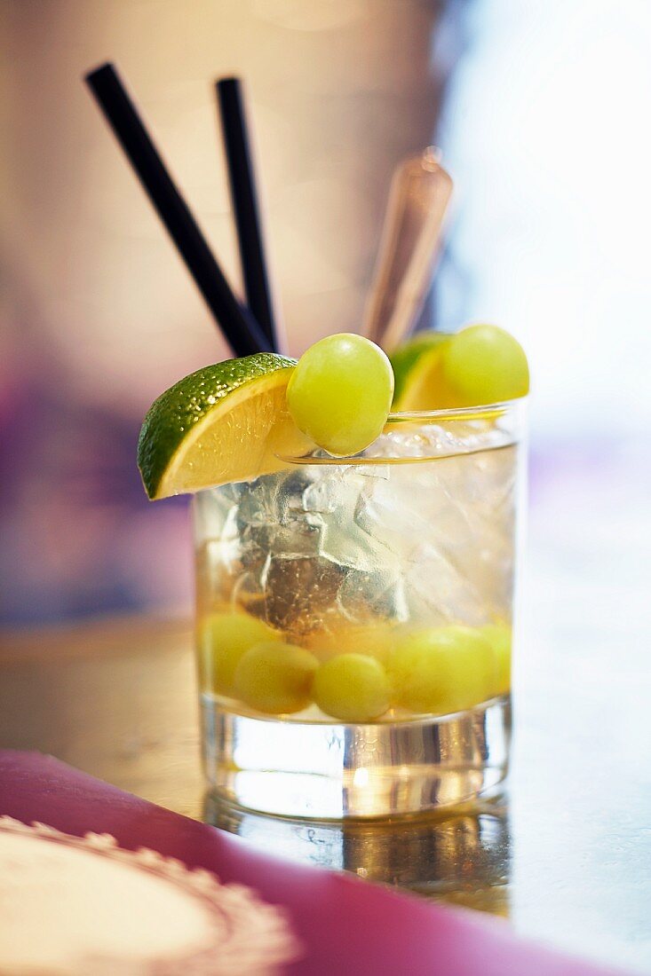A gin and Cognac cocktail with grapes