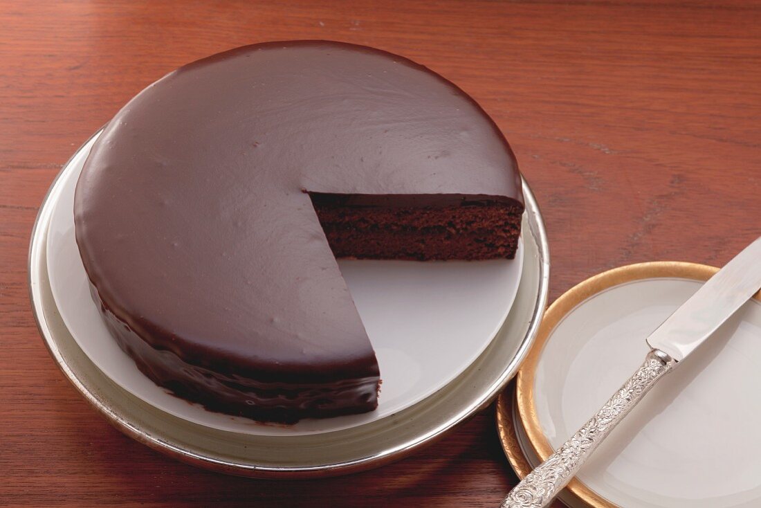 Sachertorte (chocolate cake), a piece removed