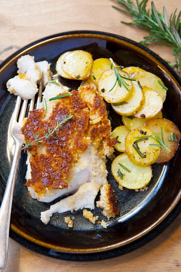 Fish fillet with parmesan crust and roast potatoes