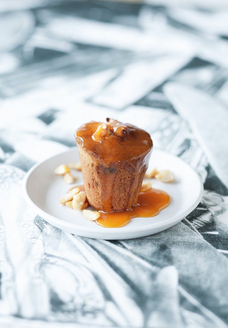 An almond and date cake with an orange and caramel sauce