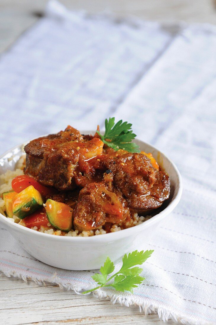 Lamb ragout with courgettes and coriander on a bed of couscous