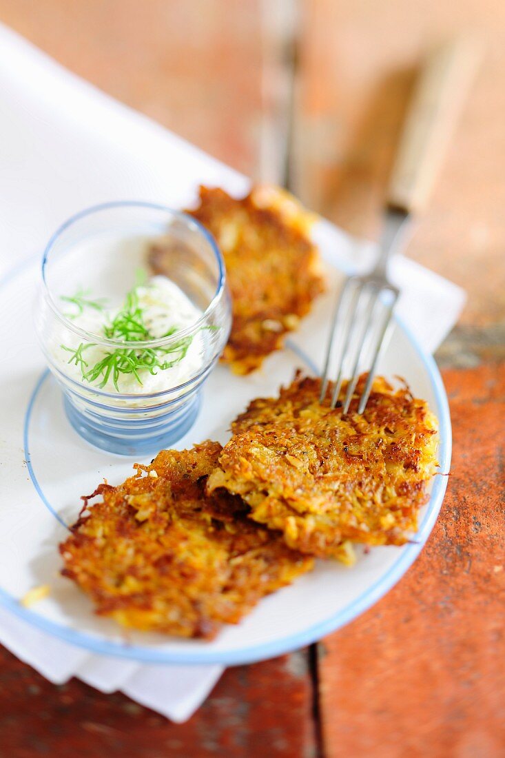 Sauerkraut fitters with unripe spelt grains and a garlic dip