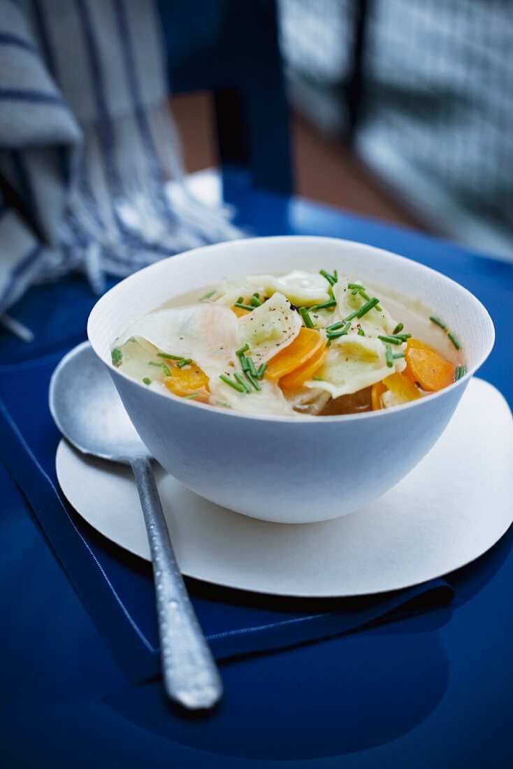 Clear broth with Ravioles de Royan (ravioli with cheese filling, France)