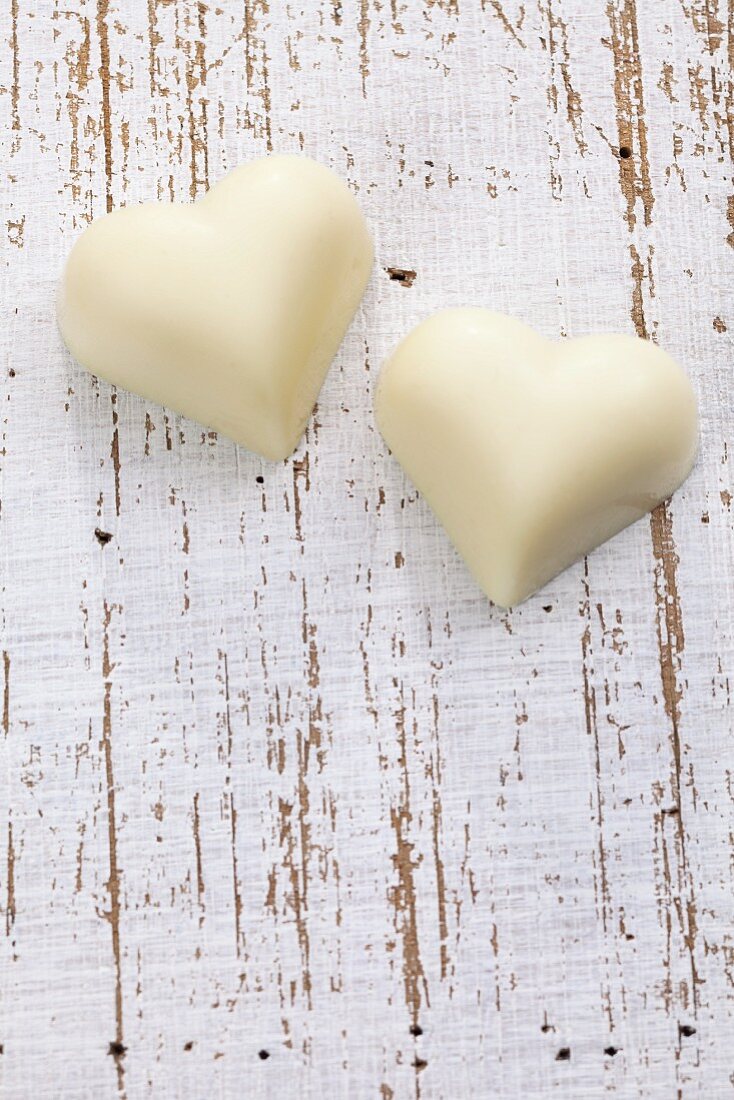 Two white chocolate hearts