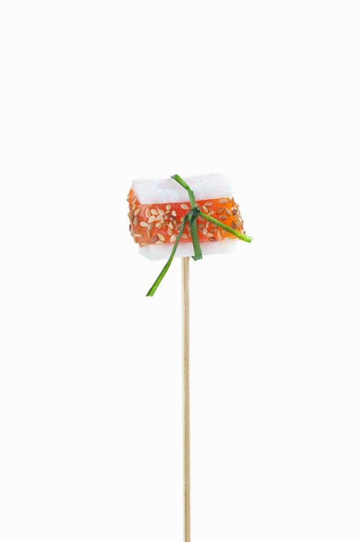 Skewer with a black radish and salmon (Japan)