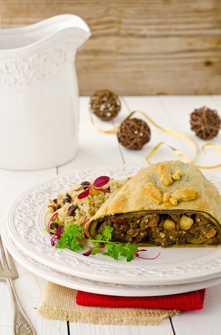 Christmas strudel filled with aubergines, chickpeas and capers