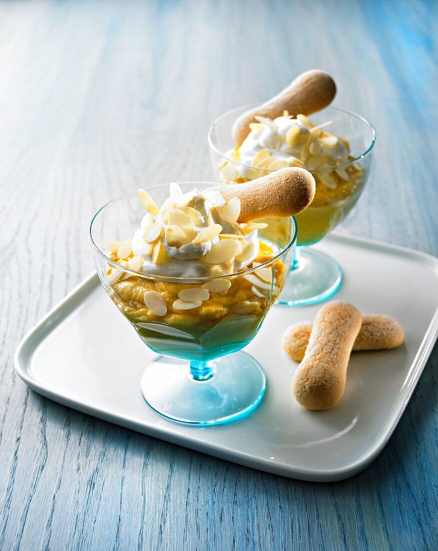 Apricot cream with whipped cream, almonds and sponge fingers