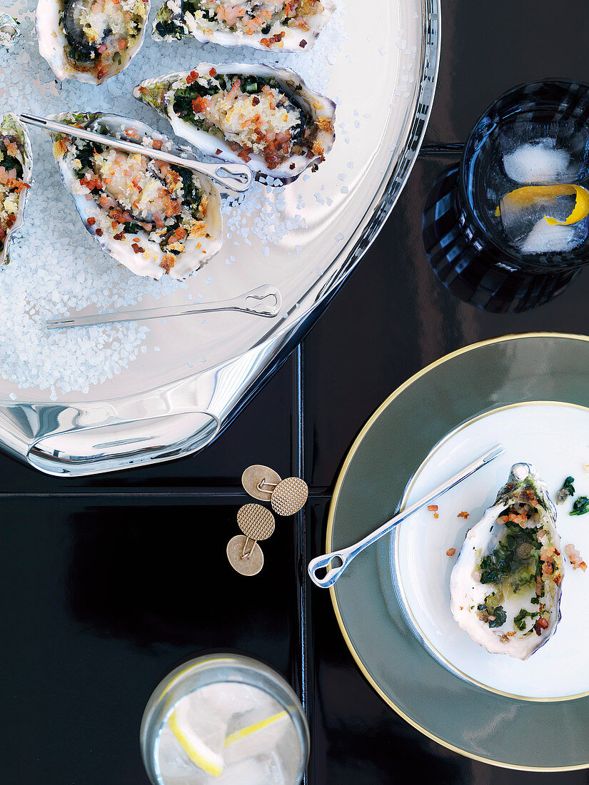 Oysters Rockefeller and two cocktails (Tom Collins, and an Old Fashioned made with tequila)