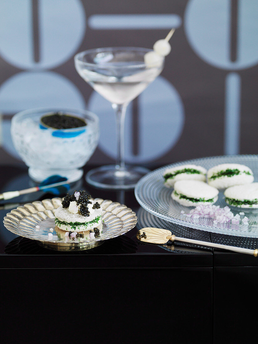 Herb sandwiches with caviar and a Gibson cocktail