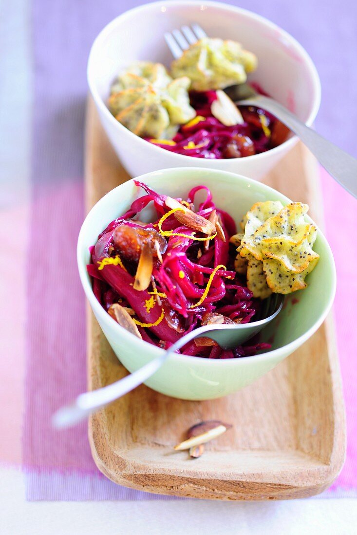 Red cabbage salad with oranges and cranberries and duchess potatoes with poppy seeds