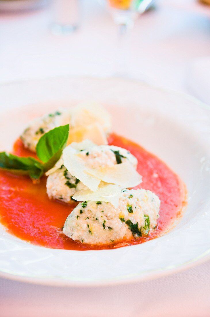 Malfatti (ricotta dumplings in tomato sauce, Lombard, Italy)