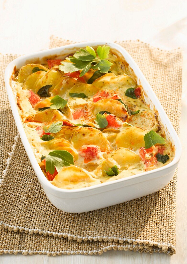 Potato bake with tomatoes and parsley