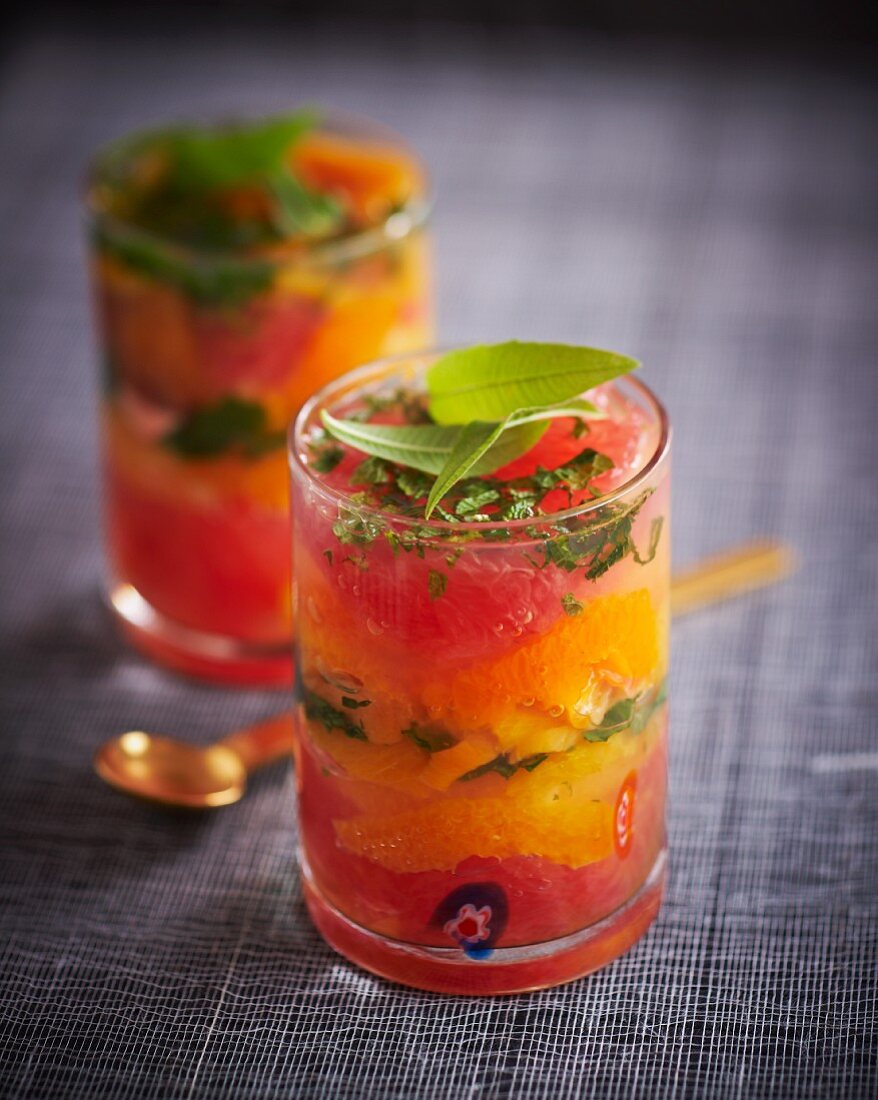 Aromatic fruit dessert with peppermint and lemon verbena