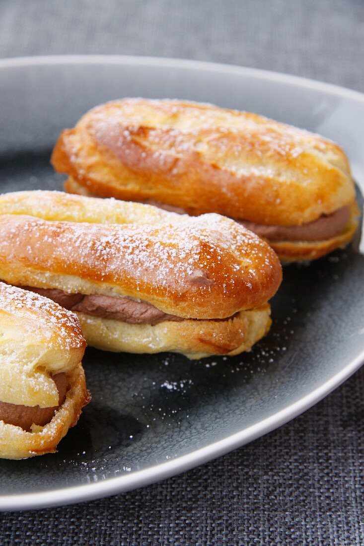 Eclairs filled with chocolate cream