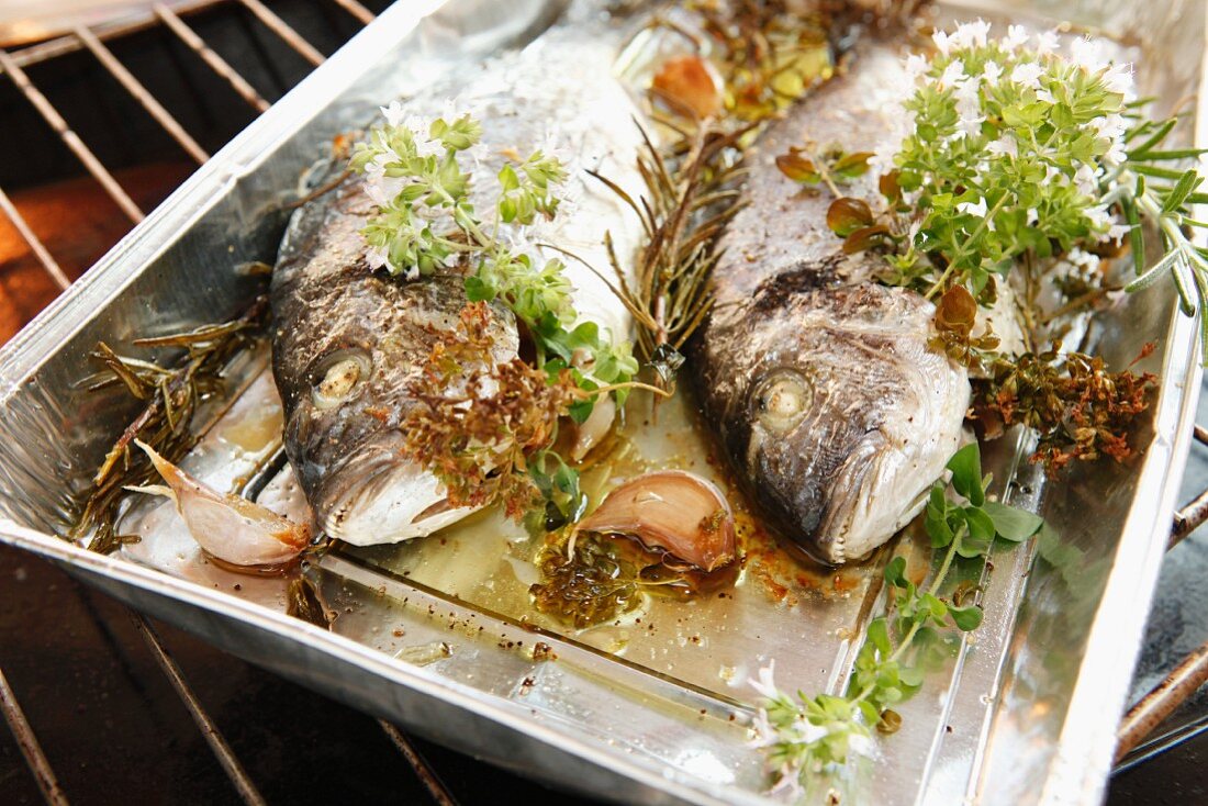 Oven-baked bream with herbs and garlic