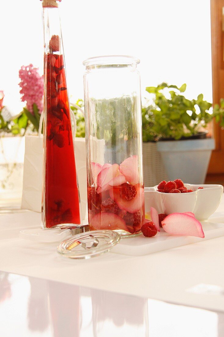 Raspberry vinegar and raspberry and rose vinaigrette being prepared